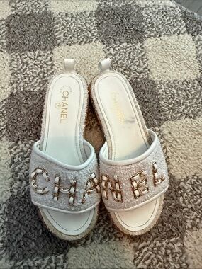 CHANEL White Tweed Slide Mules with Gold Chain Lettering
